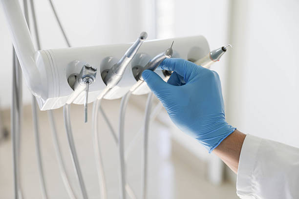 Professional Tooth Extraction technician working in Flower Hill, NY
